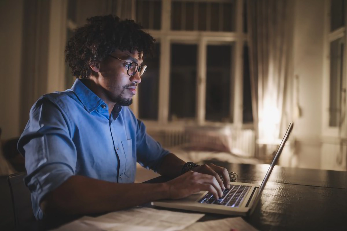 a man using a laptop