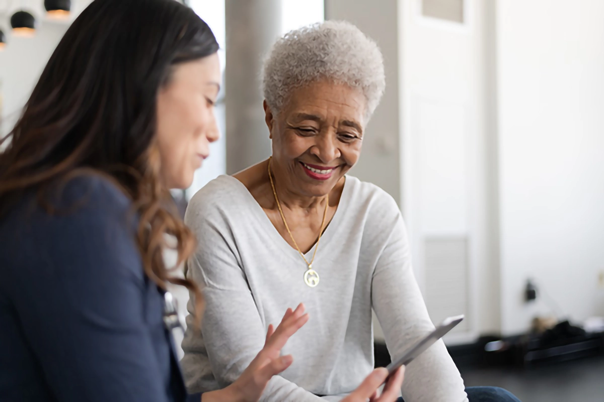 elderly person using technology