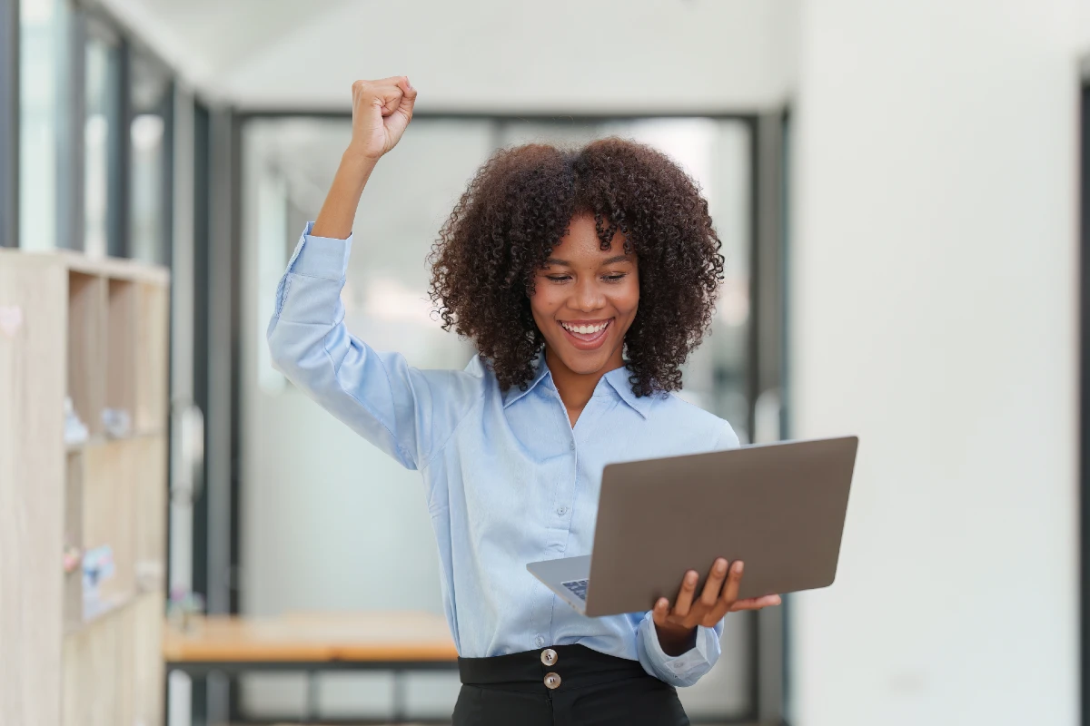 Person holding a laptop